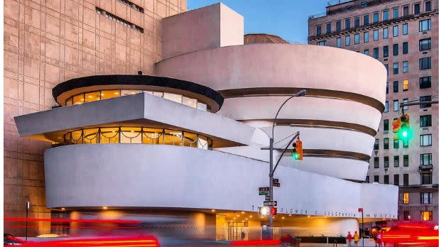 Exterior of Guggenheim Museum, lit up at dusk