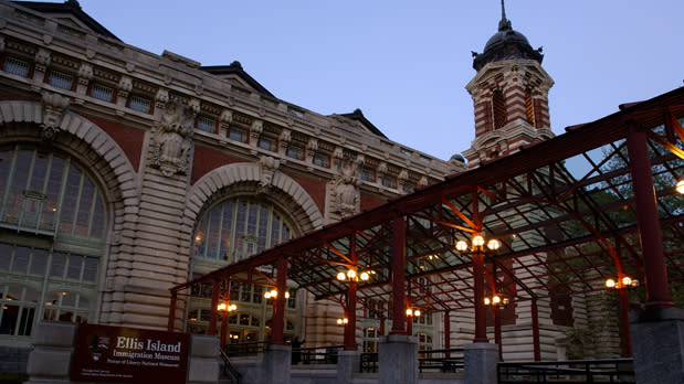 Exterior view of Ellis Island at dusk